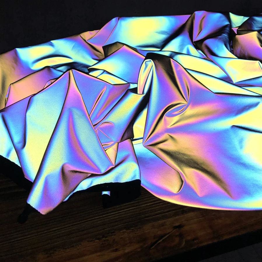 What are the key features of reflective fabric?